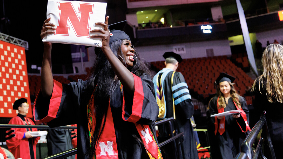Husker Nyoka Lasu celebrates after receiving a bachelor’s degree in secondary education during commencement exercises on Dec. 21, 2024