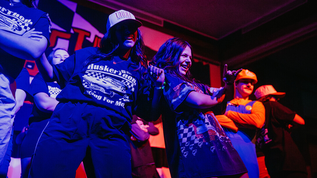 Students dance on stage during the HuskerThon fundraiser in the Nebraska Union on March 1.