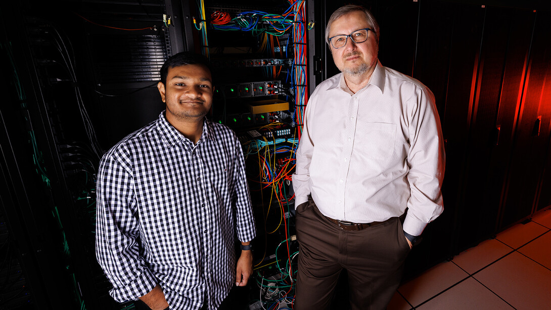 Naafis Shahed (left), graduate student in physics and astonomy, stands alongside Evgeny Tsymbal, George Holmes University Distinguished Professor in physics and astronomy, in the server room of the Holland Computing Center.