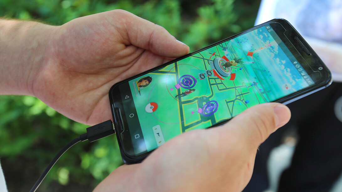 A Pokémon Go player searches for characters near Sheldon Museum of Art on July 13.