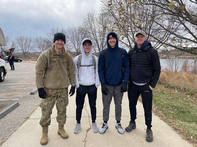 Gabe Kendall, left, and fellow 2021 ruck marchers