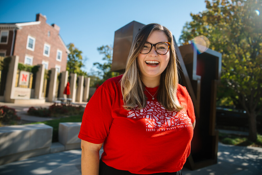 Grace Puccio is photographed in front of the Alumni Center.