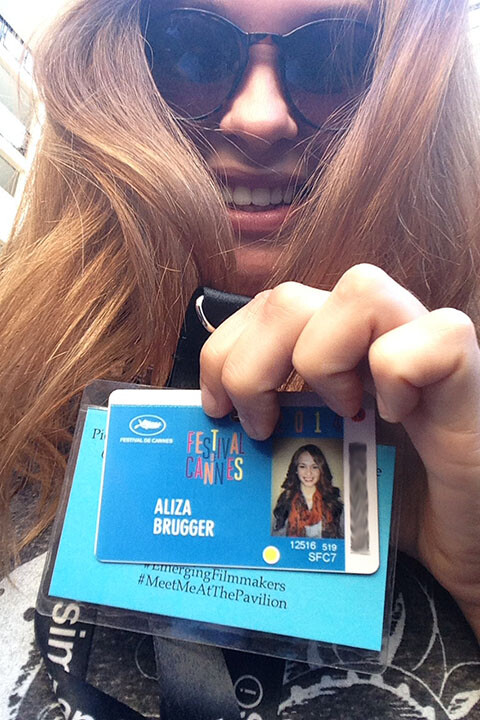 Aliza Brugger shows her Cannes Film Festival credentials. Brugger and five others from UNL worked in the American Pavilion during the event.