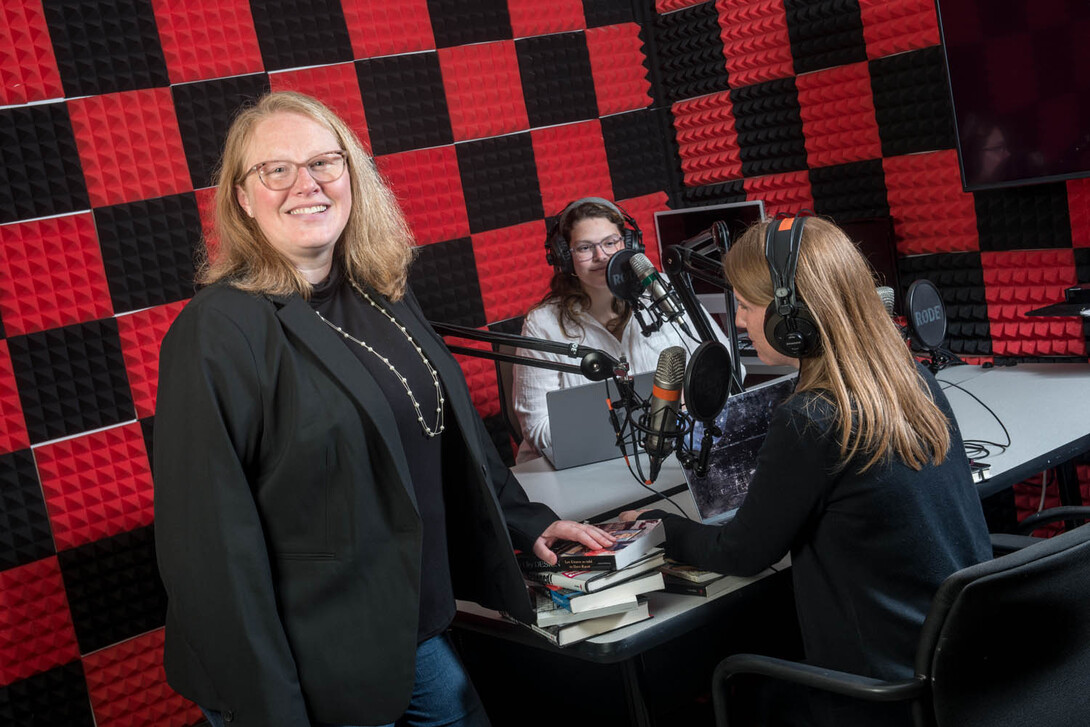 Kelli Boling is photographed in the podcast studio in the College of Journalism and Mass Communications.