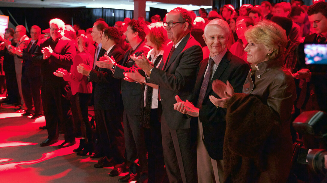 Members of Johnny Carson's family and the Carson Foundation applaud as "March of the Cornhuskers" was played during the Nov. 6 gift announcement. Pictured (from right) is Karlyn Carson, Dick Carson, Jeff Sotzing, Peggy Sotzing, Larry Witzer, Allan Alexander and Larry Heller.