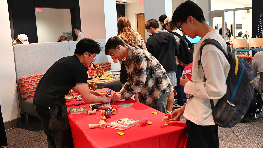 Students learning origami