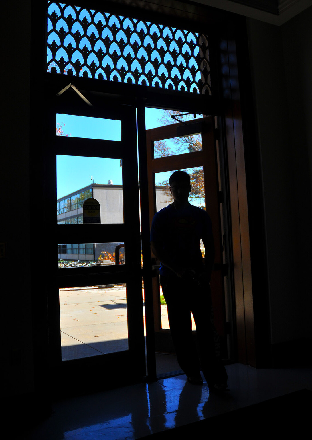 A student enters Brace Hall through the east door on Nov. 4.