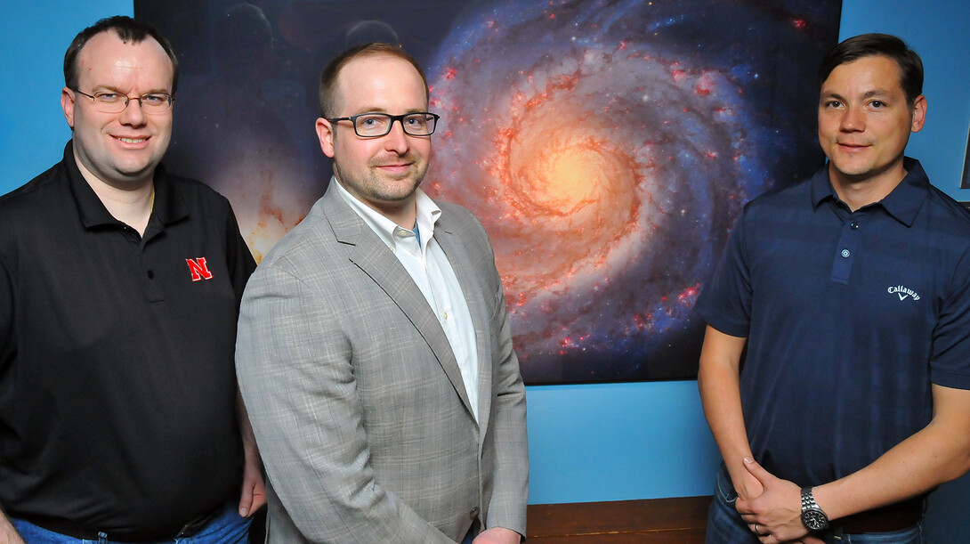 A research team that includes (from left) Peter Harms, Adam Vanhove and Mitchel Herian is helping NASA measure how lengthy space flights will effect the mental wellbeing of astronauts.
