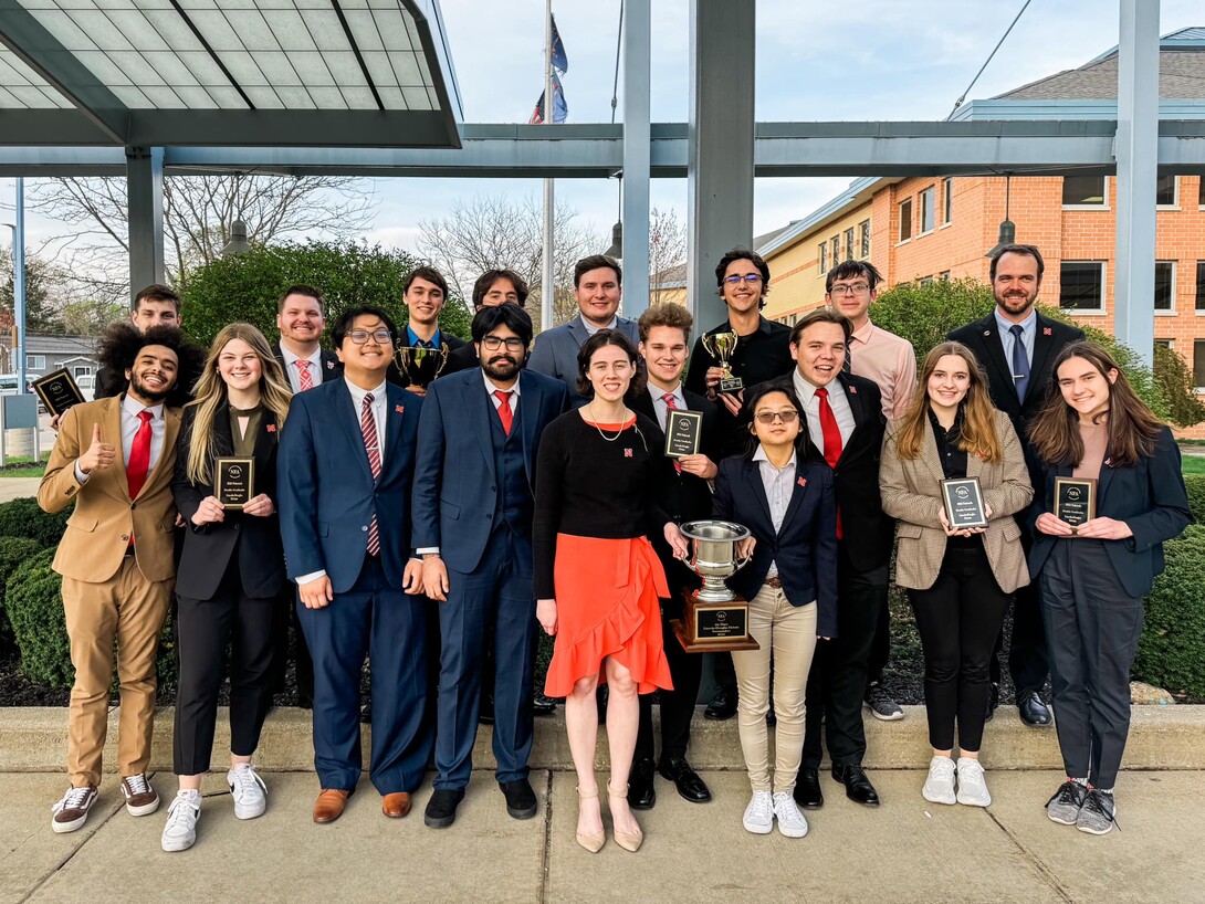 Debate members who competed at the national tournament are (front, from left) Andre Swai, assistant coach, Britton Teply, Loc Nguyen, Arjun Rishi, Juliana Quartrocchi, Nevin Butler, Jacob Wolfe, Chloe Ong, Jack Burchess, Serena Schadl, Elena Belashchenko, (back, from left) Jack Britten, Assistant coach Zach Thornhill, Grant McKeever, Caleb Alexander, Wallenburg, Joel Henson, and coach Justin Kirk. 