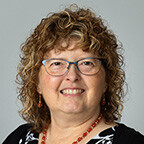 a headshot of Dr. Ross