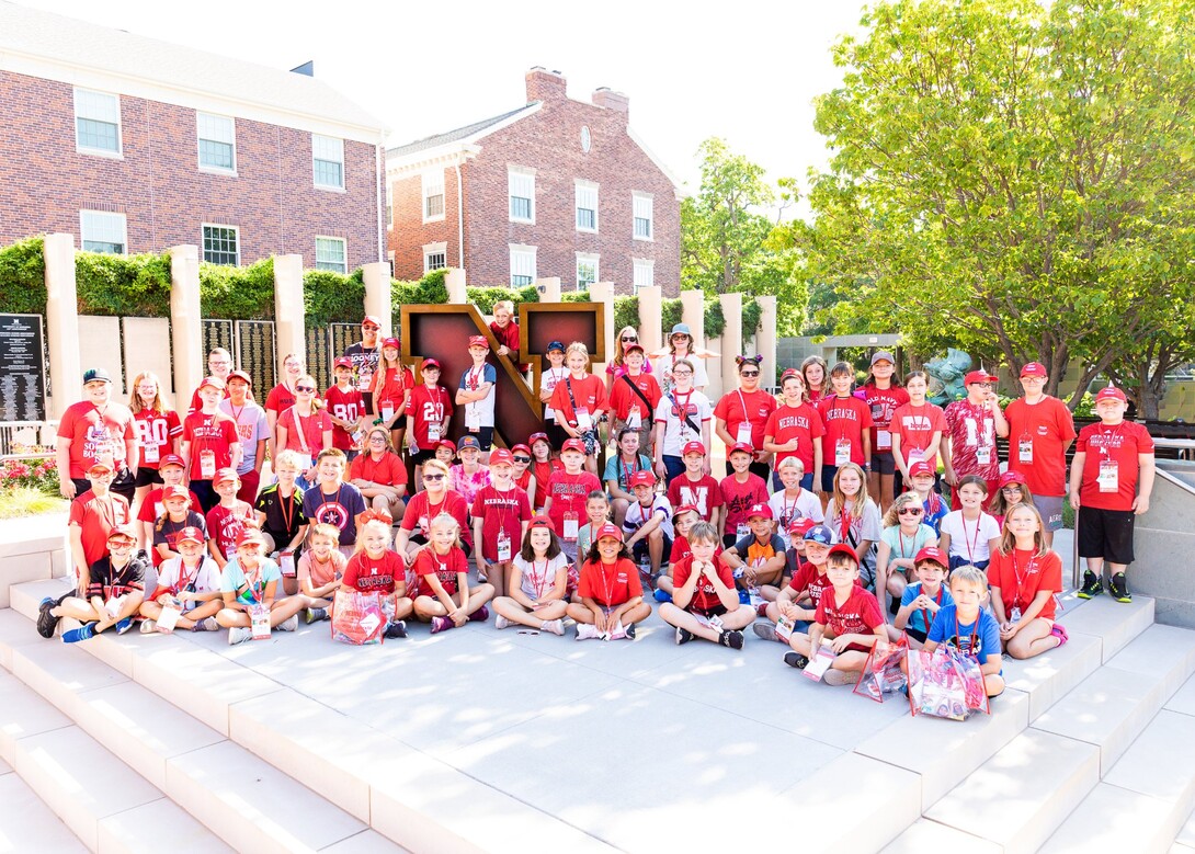 Campers attending Future Husker University in 2022 pose for a group photo.