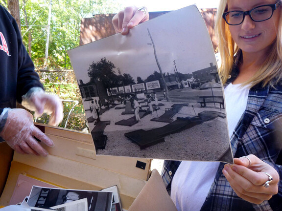 Students examine a historic North Omaha photo.