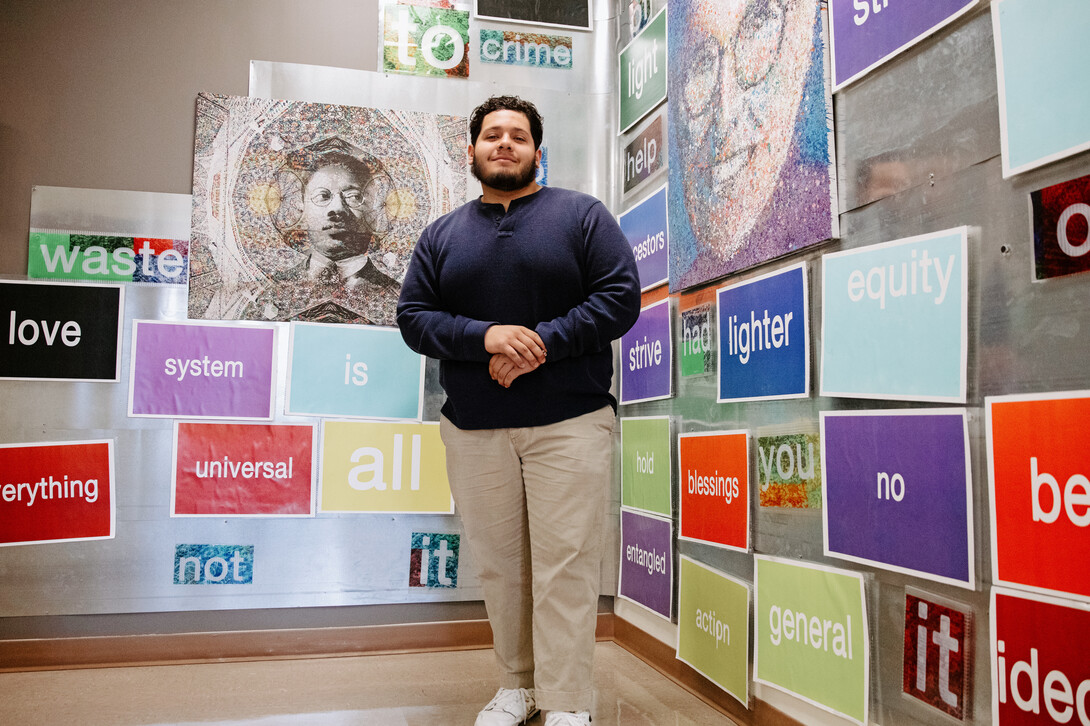 Greg Hermosillo poses in the hallway of the William H. Thompson Scholars Learning Community, located on the 1st floor of the Jackie Gaughan Multicultural Center.