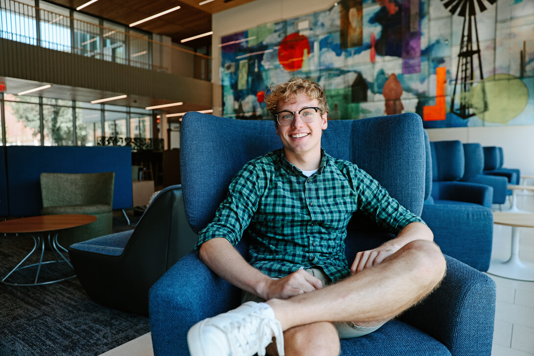 Pechous pictured here in the new Carolyn Pope Edwards Hall. Pechous is a Special Education & Political Science double major from Omaha.  