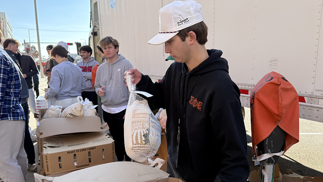 Members of Sigma Phi Epsilon prepare turkeys for distribution during the 2024 fundraiser.
