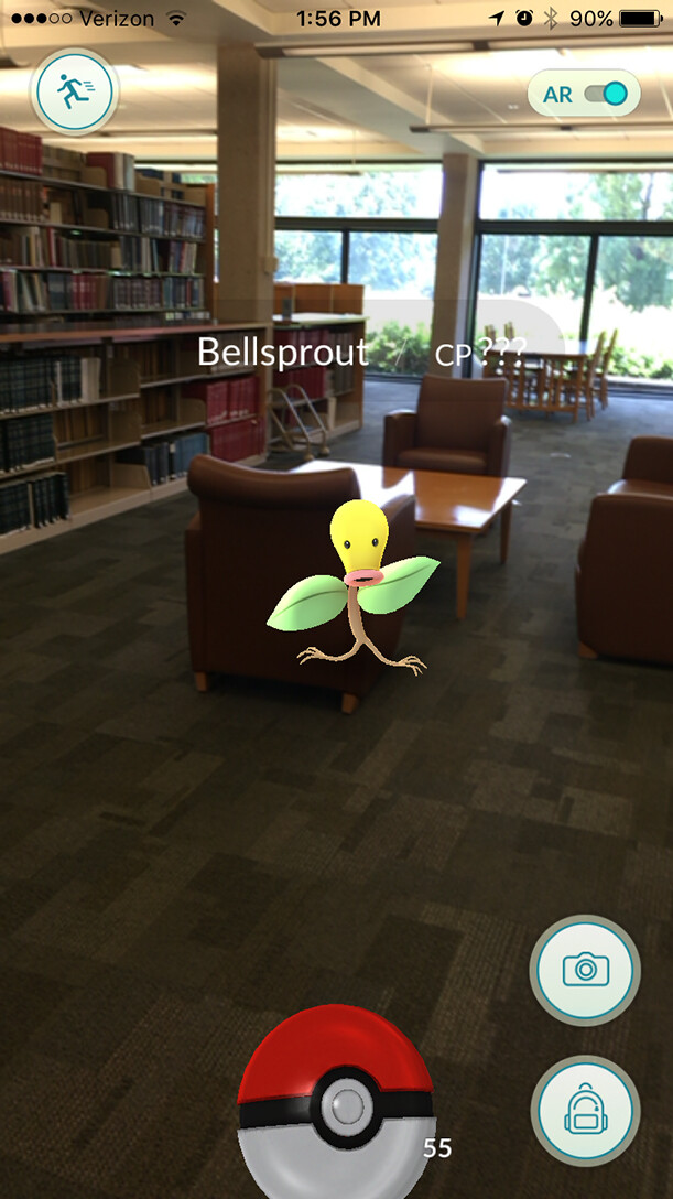 Pokémon Go screenshot of a player trying to capture a Bellsprout in the Law Library.