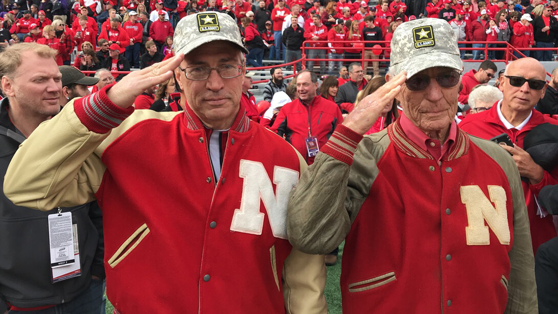 Little Jim Murphy (left) and Big Jim Murphy, both former Husker football players and military veterans, served as gate sentinels during a game in 2017.