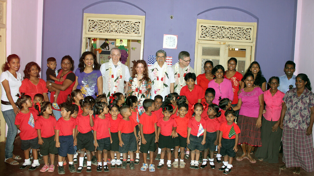 A UNL delegation poses with youth who are being helped by Syriani Tidball’s non-government organization in Colombo, Sri Lanka. The delegation visited Sri Lanka and India in January 2013. Tidball, an associate professor (back row, fifth from left), is one of two journalism faculty to receive Fulbright Specialist grants.