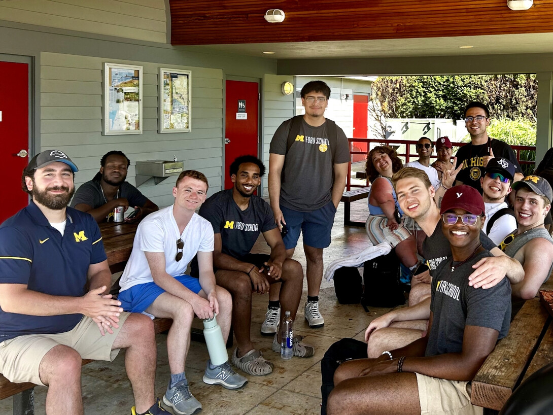 A group sits on a patio