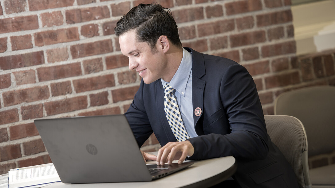 Russell Morgan, a Master of Business Administration student from Scottsbluff, Nebraska, studies in the College of Business Administration building. Nebraska's online MBA program was ranked the world's best value by Financial Times.
