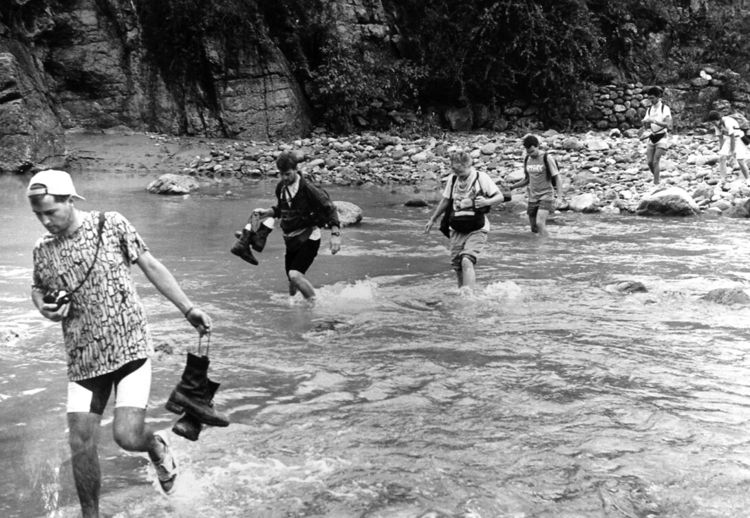 Participants in an Outdoor Adventures trip cross a stream in Colorado in the late 1970s. UNL's Outdoor Adventures program, which started in 1971, is a part of Campus Recreation.