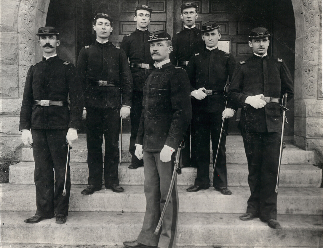 John J. Pershing poses with Nebraska U cadets during his tenure on campus. Pershing will be honored as part of new World War I service plaques being installed in Memorial Stadium.