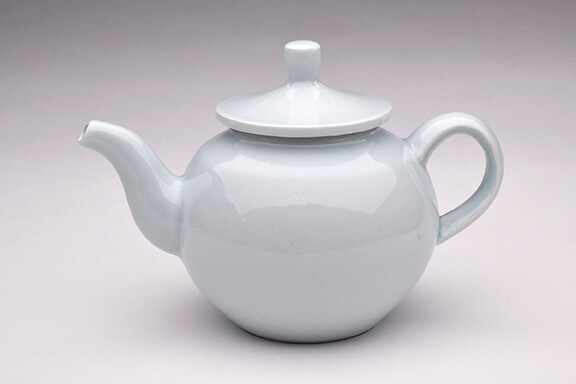 Pete Pinnell, “Teapot,” porcelain with celadon glaze, 7” x 10” x 6”, 2017.