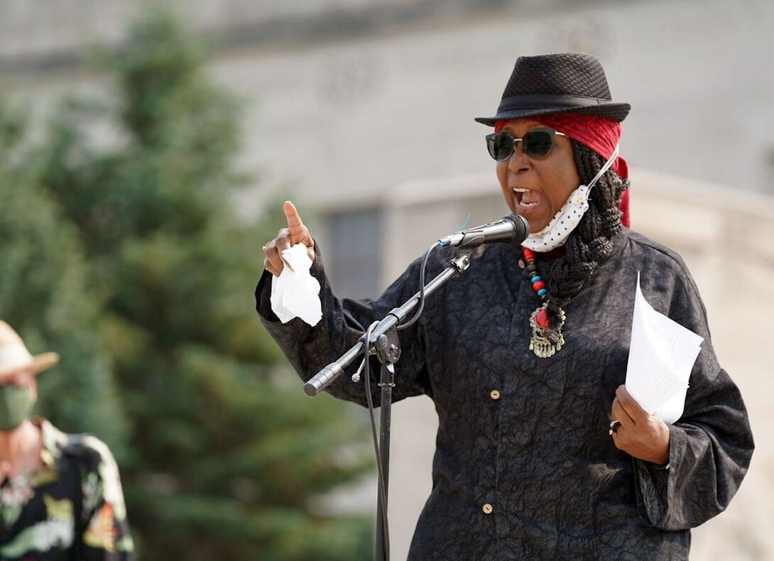 Lory Dance, associate professor of sociology and ethnic studies, speaks at a rally Sept. 20, 2020, following the death of Ruth Bader Ginsburg.