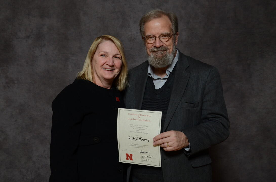 Amy Struthers, interim dean of the College of Journalism and Mass Communications, with 25-time award recipient Rick Alloway.