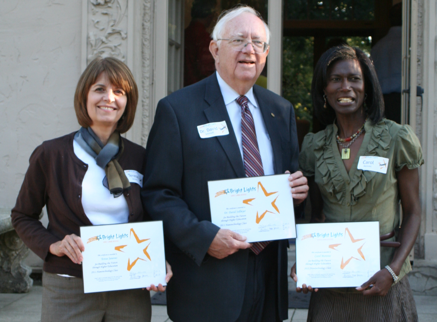 Terese Janovec, (left) David Sellmyer and Carol Moravec pose after receiving the Bright Lights "Buliding the Future Through Higher Education" award. Moravec is a science teacher at Lincoln Southeast High School who participated in the nanocamp progra