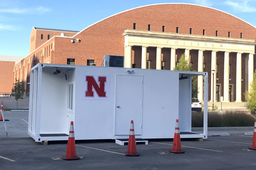 A state-donated testing pod has been moved into position at the random mitigation testing station in the East Stadium Loop. The pod will help keep medical workers warm and allow testing to continue during the winter months. The university is planning to build two more of the pods for use at the TestNebraska site in the 17th and R Street parking garage. 