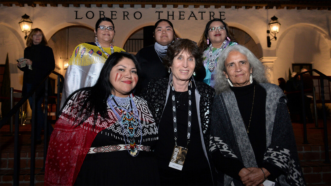 Native American judges (all front) Claudette White (left) and Abby Abinati (right) pose with "Tribal Justice" filmmaker Anne Makepeace during the documentary premiere at the Lobero Theater in Santa Barbara. White and Makepeace will take part in Nebraska's Tribal Justice Forum on Nov. 27-28. Also pictured are White's relatives (from left) Dorena, Zion and Mary.