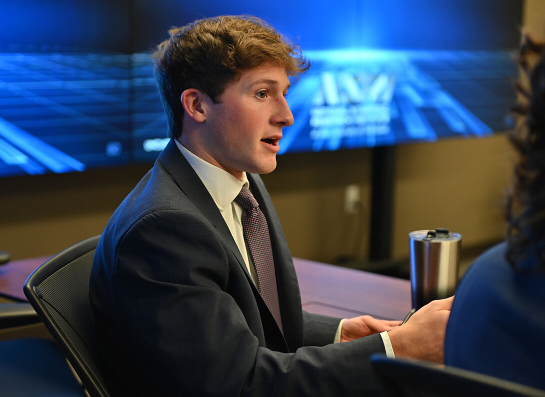 Ethan Czapla, a political science and history major at Nebraska, participates in the briefing.