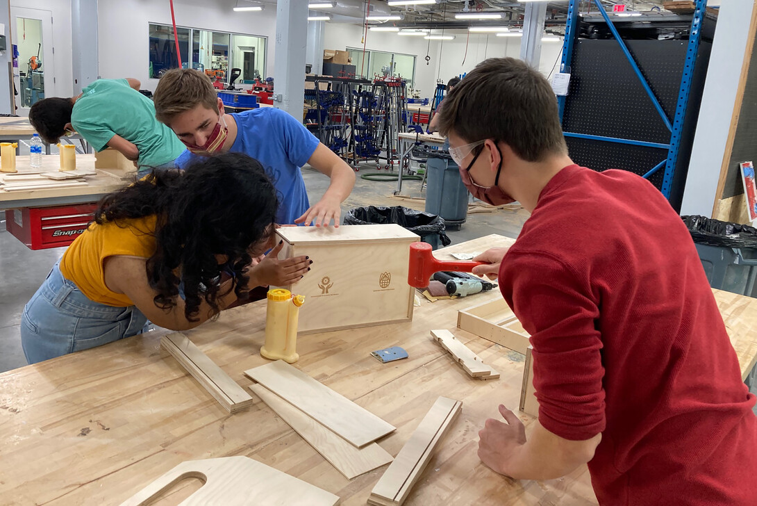 Students assemble toolboxes in Nebraska Innovation Studio Oct. 17. The boxes will be given to the Whiteclay Makerspace.