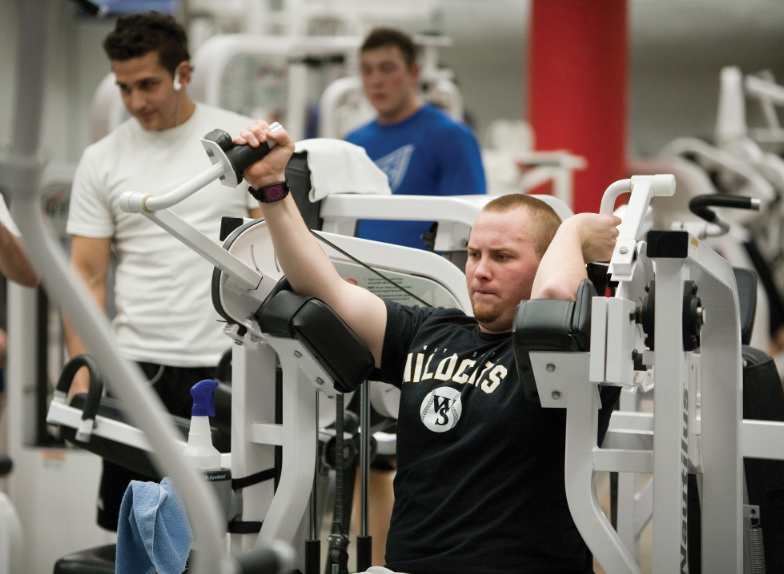 A student works out at the Campus Rec Center.
