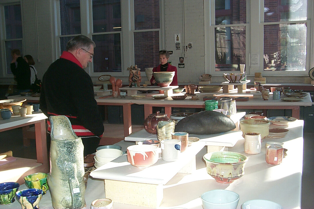 Patrons examine ceramics offered at a previous UNL Clay Club Winter Sale and Raffle in Richards Hall. The annual fundraisers for the UNL Clay Club and Fine Art Photo Club are Dec. 13-14.