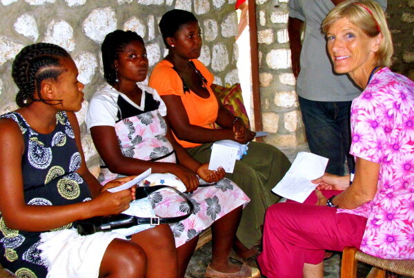 Susan Sheridan conducts a class for pregnant women who live in rural Haiti. Typically, women in labor can't endure the arduous journey down the mountain to an urban hospital. 