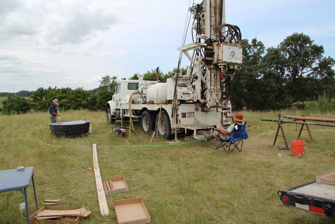 In wireline coring, a continuous core is extracted from the depth of the test hole, as opposed to just cuttings.