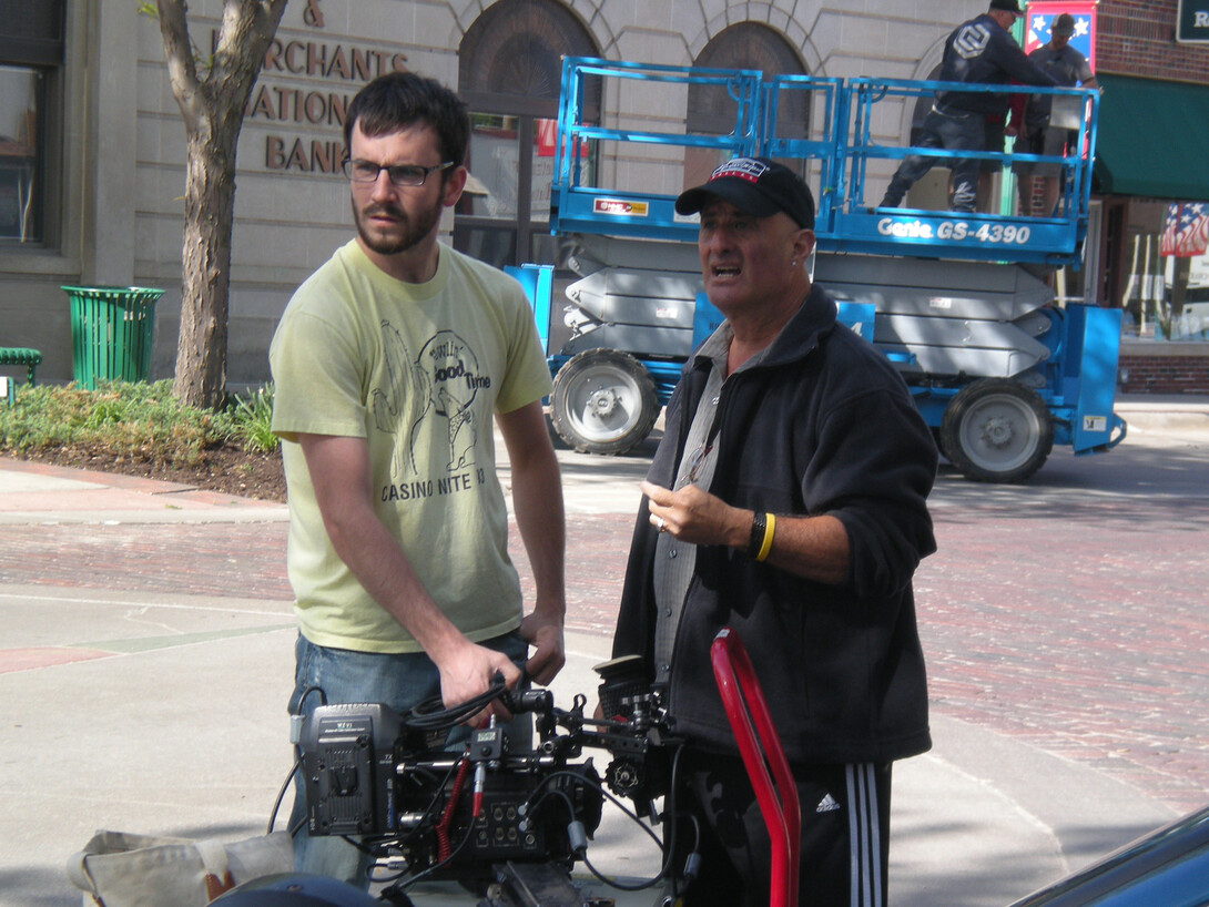 Theater and film student Aaron Nix (left) receives instructions from camera assistant Bob Heine during filming of the first Carson film.
